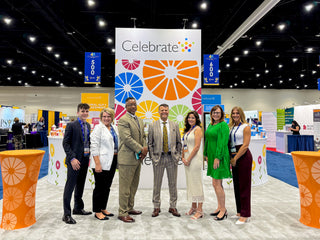 Picture of Celebrate Vitamins employees at 2024 ASMBS booth
