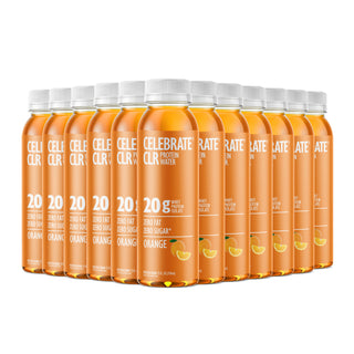 Multiple bottles of Celebrate CLR Water in orange flavor on a white background